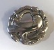 Georg Jensen. 
Sterling sølv 
broche. Model 
165. Diameter 4 
cm.