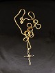 14 karat guld 
kors med perle 
2,4 x 1,5 cm. 
stemplet 585 BH 
for juveler B 
Hertz og 14 
karat guld ...