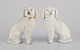 Et par antikke 
engelske 
Staffordshire 
krymmelhunde i 
...