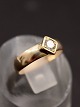 14 karat 
guldring med 
0,15 carat 
diamant 
størrelse 46 
emne nr. 607562