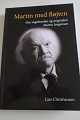 Martin med æ 
fløjt / Martin 
med fløjten
Om vagabonden 
og originalen = 
Martin 
Jørgensen
Fra ...
