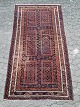 Orientalsk 
tæppe fra 
1990erne.
Det har 
brugsspor/slid.
Bredde 109cm 
Længde 202cm