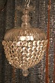 Stor ,gammel 
"Pose" prisme 
loftslampe med 
skærm og slebne 
prismer i klart 
glas. 
Prismelampen 
har ...