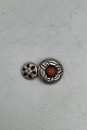 Tidlig Georg 
Jensen 
Manchetknap med 
rød Sten No. 14 

Måler 2,4cm og 
1,6cm / 0.94 
inch og 0.63 
...