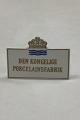 Royal 
Copenhagen 
Forhandler 
Skilt med guld