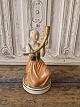 Royal 
Copenhagen 
Juliane Marie 
figur i 
overglasur - 
Pigen med 
guldhornet
No. 12242, 1. 
...