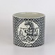 Urtepotteskjuler 
i porcelæn med 
motiv i sort 
streg af 
indianer samt 
titlen Vest. 
Nr. ...