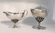Georg Jensen. 
Sølv sukkerskål 
& flødekande. 
Johan Rohde. 
Model 43. Højde 
på sukkerskål 
14 cm. ...