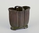 Just Andersen 
(1884-1943), 
Danmark.
Art Deco vase 
på fod med 
hank.
Diskometal. 
Fin ensartet 
...