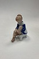 Bing og 
Grøndahl Figur 
Marianne No. 
2373 (Pige der 
binder sin sko) 

Designet af 
Claire Weiss. 
...