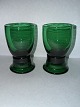 Par grønne 
Pepita glas fra 
Holmegaard 
Glasværk 19. 
århundrede. 
Fremstår i 
perfekt stand. 
H. 6,5 cm