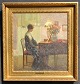Friis Nybo, 
Poul (1869 - 
1929) Danmark: 
En 
klaverspillende 
kvinde. Olie på 
lærred. 
Signeret ...