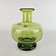 Mundblæst vase 
i grønt glas, 
fra serien 
Majgrøn.
Signeret i 
bunden 
Holmegaard 
18161 
Design ...