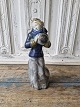 Michael 
Andersen figur 
fra 
årstidsserien - 
Vinter - kvinde 
med muffe 
No. 5252
Højde 24 cm.