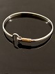 Sterling sølv 
armring med 14 
karat guld tråd 
6 x 5,2 cm. 
stemplet 925s 
og 14K emne nr. 
610290