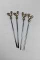 Sæt Olivenspyd 
/ Cocktailpinde 
.813 Sølv 
Delvist 
Forgyldt (4) 
Måler L 9 cm  
(3.54 inch) 
Samlet ...