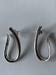 Georg Jensen 
sterlingsølv, 
Øreringe. 
INFINITY. 
De måler H: 
3,5 x B: 1,5 
cm.
Perfekt stand.