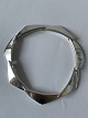 Georg Jensen 
sterlingsølv, 
Peak armbånd 
med 7 led 
designet af 
Bent 
Gabrielsen.
Måler 20 cm i 
...