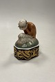 Royal 
Copenhagen 
Gerhard Henning 
Overglasur 
figur Grædende 
Faun på stand 
No 1188
Måler 15.9 ...
