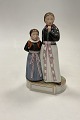 Royal 
Copenhagen 
overglasur 
figur Pieter og 
Trein Dirch 
Jan's Drenge og 
Pigedragt No 
12105. ...