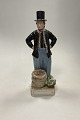 Royal 
Copenhagen 
Overglasur 
Figur Jan 
Hansen Schmidt 
Torvedragt, 
Amager No. 
12103
Måler 31cm ...