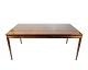 Spisebord med 
udtræk i 
palisander, 
designet af 
Johannes 
Andersen og 
produceret af 
Chr. ...