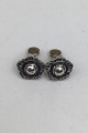 Georg Jensen 
Sterling Sølv 
Øreclips 
Årssmykke 2002 
Måler Diam 1.8 
cm (0.70 inch) 
Samlet vægt ...