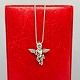 A necklace in 
14k white gold 
set with a 
diamond angel