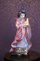 Hjorth ceramic 
of young Asian 
woman with dove 
with fine 
glaze. 
Sign. L. 
Hjorth no. 
531.- ...