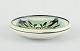 Kähler, 
Denmark.
Ceramic bowl 
with floral 
motif. Glaze in 
green and black 
...