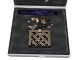 Georg Jensen 
Christmas 
Nordica Juleuro 
med motiv fra 
1990 - Julekurv 
i sølv.
Ligger i ...