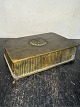 Art Deco 
lågskrin i 
bronce 
produceret fra 
den danske 
metalbarerfabrik 
Fuglsang. 
Fremstillet ...