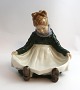 Royal 
Copenhagen. 
Porcelænsfigur. 
Fanø pige. 
Model 1315. 
Højde 13 cm. (4 
sortering)
