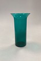 Grøn cylindrisk 
Glasvase, stor. 
Formodentlig 
udenlandsk 
oprindelse. 
Måler 21 cm / 
8,26 in.