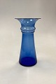 Holmegaard 
Harmony Vase, 
transparent 
blå. Designet 
af Michael Bang 
i 1989.
Måler 21,6 cm 
x 11,5 ...