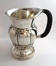Georg Jensen. 
Design 7. 
Sølvkande. 
Sterling (925). 
...