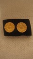 Margurit 
ørestik
Sølv med 18k 
guld belægning 
Diamerer ø: 15 
mm