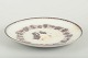 Gefle
Plate 
“Mullbär” with 
putti figures, 
c. 1880/90s.
Round faience 
plate with 
relief ...