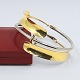 Ole Bent 
Petersen; Dansk 
design armring 
af 18 kt. guld 
...