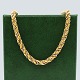 A long twisted necklace of 14 kt. gold and white gold.The chain can be opened.L. 80 cm. W. ...