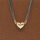Per Borup; Heart clasp in 14kt gold, including chain of oxidized silver and 14k gold. The heart ...