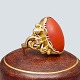 A ring in 14k 
gold from 
around 1920. 
Set with a 
coral.
Ring size 49.
Coral 
measurements: 
1,7 x ...