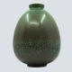 Saxbo 
stoneware.
Eva 
Stæhr-Nielsen 
for Saxbo; A 
vase decorated 
with a blue and 
brown glaze ...