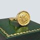 A ring in 14k 
gold with 
decoration of a 
head.
Ring size 51.
Stamped "585".
Antik ...