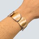 Ole Lynggaard; 
Bracelet in 14k 
gold and white 
gold, with four 
diamonds, a 
total of 0.28 
ct. W VS ...