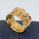 Henning Skovgaard; Wide ring in 14k gold, set with four diamonds, total 0.20 ct. Ring size 53. ...