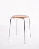 Dot stool designed by Arne Jacobsen, made in walnut veneer with a chrome-plated steel frame. A ...