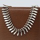 Georg Jensen silver jewellery.A necklace made of sterling silver designed by Bent ...