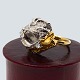 Julia Plana; Ring of 18k gold and white gold, set with six diamonds, approx. 0,70 ct. Ring size ...
