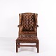 Høj kvalitet 
wingback 
armstol fra ca. 
1910 i brunt 
originalt 
læder. Klassisk 
højrygget model 
med ...